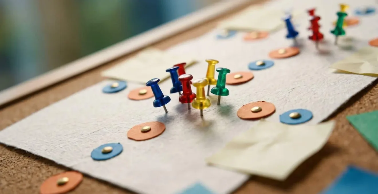 Extreme close-up of calendar with abstract colored markers indicating different KPI review cycles